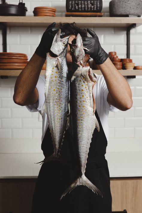 Unveil the pure essence of seafood culinary artistry with our latest Pinterest post. Witness a skilled chef, harboring years of refined expertise, as he proudly holds the catch of the day in preparation for a gourmet transformation. The rustic yet elegant backdrop sets the perfect scene for a seafood photoshoot, portraying a seamless blend of nature and culinary craftsmanship. Seafood Product Photography, Seafood Restaurant Photography, Seafood Photoshoot, Seafood Photography Food Styling, Chef Photoshoot, Fish Food Photography, Seafood Photography, Photoshoot Lights, Steam Recipes