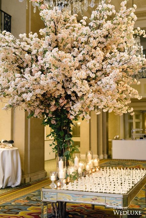 An All-White Wedding Filled with Cherry Blossoms and Pops of Peonies | WedLuxe Magazine Blossom Tree Wedding, In Tables, Pink Cherry Blossom Tree, Peonies Centerpiece, Tree Centerpieces, Cherry Blossom Wedding, Card Tables, All White Wedding, Pink Cherry Blossom