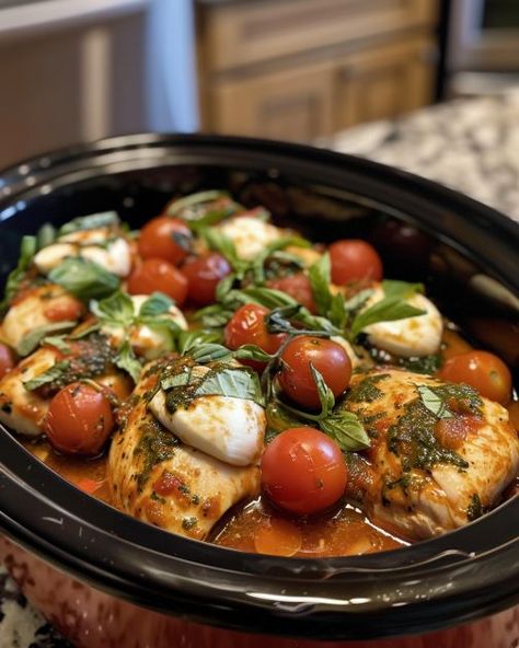 Nothing beats this recipe from my Italian nana! Italian Food Crockpot Recipes, Crockpot Chicken Caprese, Healthy Italian Crockpot Recipes, Caprese Chicken Crockpot, Cherry Tomato Crockpot Recipes, Italian Sausage Slow Cooker Recipes, Italian Meals For A Crowd, Light Crockpot Recipes, Caprese Casserole