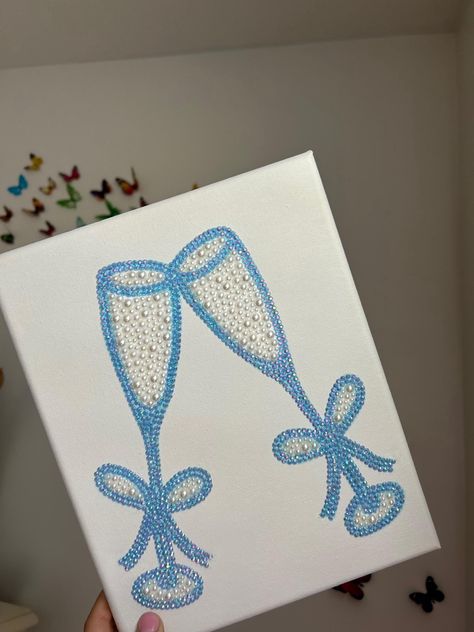 Handmade rhinestone canvas! This canvas is an 8x10.  Made to order! Two champagne glasses in a super cute blue color with white pearls! Bead Art Canvas, Printable Diamond Painting Patterns, Sparkle Canvas Art, Paintings Canvas Easy, Diamond Art Canvas, Zta Canvas Painting, Rinstonestone Art, Gem Canvas Art Easy, Bedazzled Painting Ideas