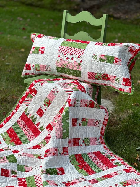 Haul out the tissue, paper and bows! It's time for a wrapping party! Get festive making this beautiful set for the holidays! Finished Quilt is 63" x 75" Pillow measures 16" x 38" 12" block size Advanced Beginner skill level All sales are finalSee policies and terms for further information Quilt Pattern With Squares, Simple Christmas Quilts, Jelly Roll Christmas Quilt Patterns, Nine Patch Quilt Patterns Ideas, Peppermint Quilt, Easy Christmas Quilt Patterns, Christmas Quilt Blocks Free Pattern, Christmas Wrapping Party, Christmas Quilts Ideas Free Pattern