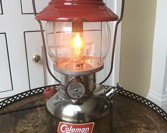 UpcycledColemanLamps on Etsy Led Bottle Light, Lantern Table Lamp, Led Accent Lighting, Coleman Lantern, Lamp Rustic, Old Lanterns, Driftwood Lamp, Rustic Table Lamps, Dimmable Table Lamp