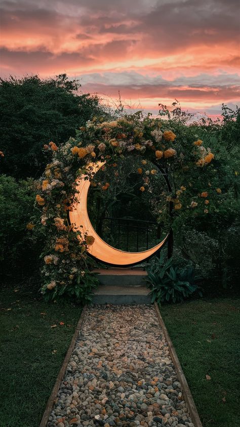 If you're doing some landscape design for your garden, here are some magical moon gate ideas to create an enchanting space. #moongates #landscaping #landscapedesign #witchgarden Moon Portal Garden, Moon Garden Art, Garden Circles Design, Witchy Backyard Aesthetic, Ethereal Garden Aesthetic, Garden Moon Gate Diy, Moon Gate Garden Diy, Trampoline Moon Gate, Moon Gate Garden Entrance