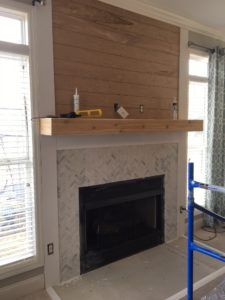 Our fireplace overhaul…from drab to fab! See the shiplap, herringbone tile and wood mantel transformation! Herringbone Tile Fireplace, Herringbone Fireplace, Wood Mantle Fireplace, Fireplace Renovation, House Fireplace, Fireplace Redo, Fireplace Update, Wood Mantel, Brick Fireplace Makeover