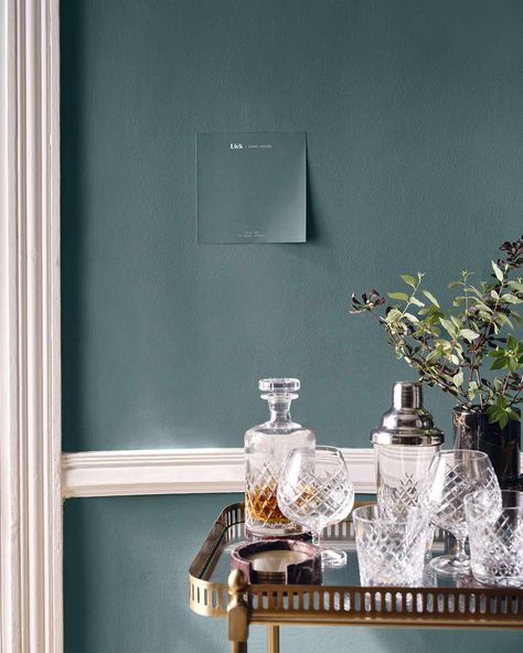 Teal Paint Colors, Dark Office, Teal Accent Walls, Houses Around The World, Teal Living Rooms, Dining Room Paint Colors, Teal Bathroom, Paint Trends, Dark Paint Colors