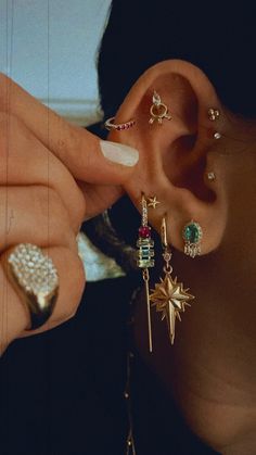 Ear Piercing Two Holes, Super Pierced Ears, Folded Ear Piercing, Curated Piercing Ideas, Colorful Ear Curation, Earring Layering Ideas, Beautiful Ear Piercings, Ear Party Inspiration, Earring Stack Ideas Mixed Metals