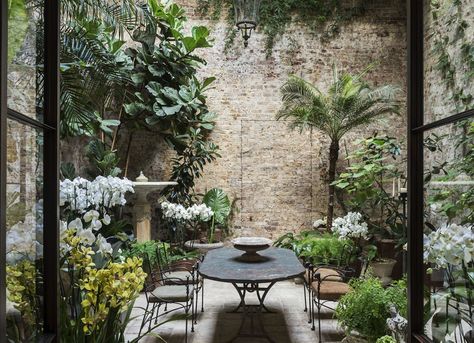 With April officially under way, we're taking notes on spring to-dos and a verdant conservatory over on Gardenista. Don't miss our other must-read spring p Garden Seating Area, Small Courtyard Gardens, Courtyard Gardens Design, Small Courtyards, Patio Interior, Small Space Gardening, Garden Seating, Small Garden Design, Courtyard Garden