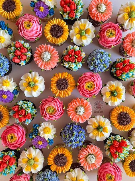 Flora Themed Party, Wedding Dessert Table Colorful, Flower Theme Centerpieces, Flower Inspired Food, Wild Flower Wedding Cupcakes, Bright Flower Cupcakes, Wildflower 1st Birthday Party Food, Floral Baked Goods, Love Is In Bloom Cupcakes