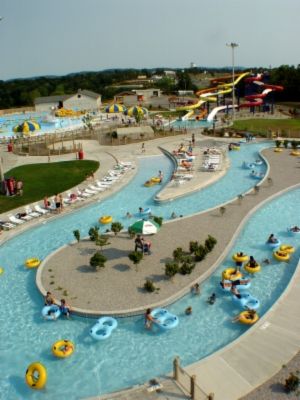 The lazy river at SomerSplash Waterpark in Somerset. Giant Water Slide, Camping France, Lap Swimming, Piedmont Park, Building Stone, Lazy River, Mountain Park, Building A Pool, Stone Mountain