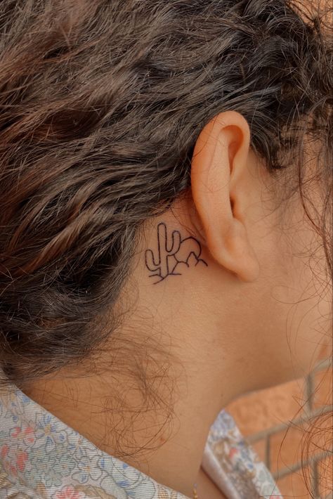 #tattoo #tattooideas #mountaintattoo #cactus Cactus Tattoo Behind Ear, Behind The Ear Tattoo Ideas Western, Cute Small Western Tattoos, Western Stick And Poke Tattoo, Western Behind The Ear Tattoos, Tattoo Mexico Ideas, Dainty Cactus Tattoo, Western Ear Tattoos, Western Finger Tattoos For Women