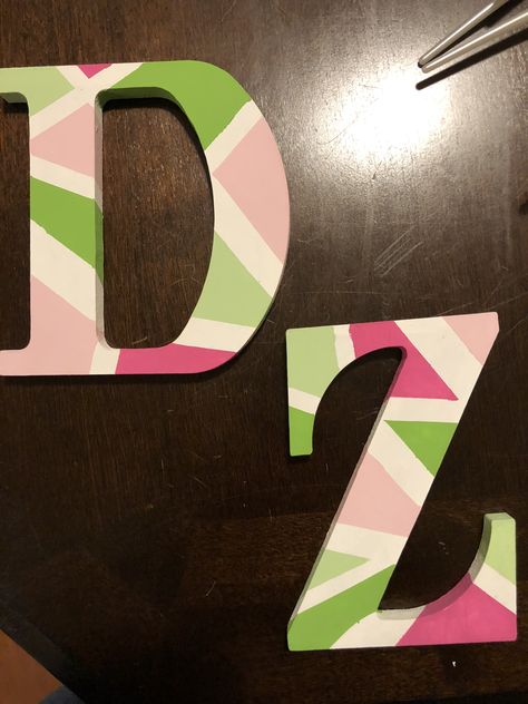 Wooden sorority letters simple design Painting Sorority Letters, Delta Zeta Letters Painted, Painting Wooden Letters Designs, Sorority Letters Painted Wooden Pink, Sorority Letters Painted Wooden Easy, Wooden Letter Painting Ideas Design, Dz Letters Painted, Painted Greek Letters Wooden, Painted Sorority Letters Wooden