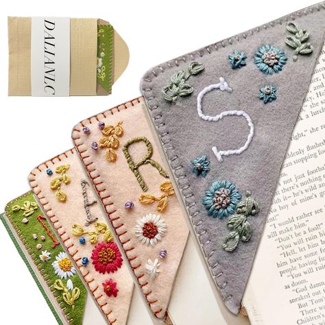 PRICES MAY VARY. Unique Design: This bookmark is stitched completely by hand and is made from felt and recycled cardboard. This is a gift full of surprises for book lovers. Multiple Choices: This bookmarks are available in 4 design options,spring/summer/ fall/ winter. Personalized Customize 26 letters, you can choose according to your needs. Size of product: 3.7*3.7inch, Isize has been adjusted many times, suitable for most books, beautiful embroidery, This page divider can make you have fun whe Hand Embroidered Corner Bookmark, Embroidered Corner Bookmark, Cute Flower Embroidery, Book Marker, Felt Bookmark, Corner Bookmark, Corner Bookmarks, Embroidery Book, Reading Gifts