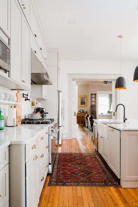 The Reveal: Our Row House Kitchen Renovation is Complete! | 17 Apart Row House Kitchen, Row Home, White Brick Fireplace, Farmhouse Kitchen Backsplash, Frog House, Powder Room Vanity, Dark Countertops, White Shiplap Wall, White Subway Tile Backsplash