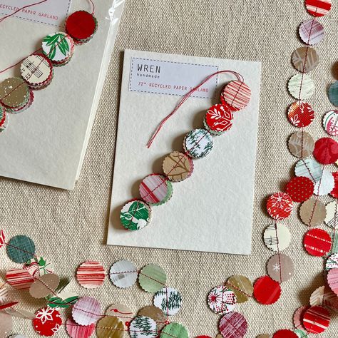 This is a 72" (6') recycled paper garland stitched on a sewing machine. The 1" round discs are punched from various holiday themed papers. String on a tree or a mantle for a festive decoration. Papers will vary slightly from photo. Check out my other Holiday items: https://www.etsy.com/shop/wrenhandmade?section_id=31530348