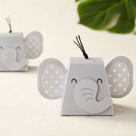 Adorably wrap your favorite goodies with these safari animal favor boxes! Baby Shower Elephant Table, Elephant Centerpieces Boy, Elephant Wedding Favors, Baby Shower Elephant Candy Table, Elephant Baby Shower Thank You Gifts, Baby Decorations, Elephant Baby Shower Favors, Elephant Crafts, Favors Ideas