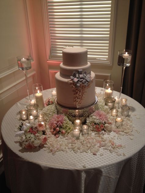 A lovely table for the cake with candles and flowers... Cake Table With Candles, Cake Table Ideas Wedding, Diy Wedding Cake Table, Wedding Cake Table Decor, Wedding Cake Table Ideas, Cake Table Decorations Birthday, Cake Table Wedding, Birthday Cake Table, Wedding Cake Table Decorations