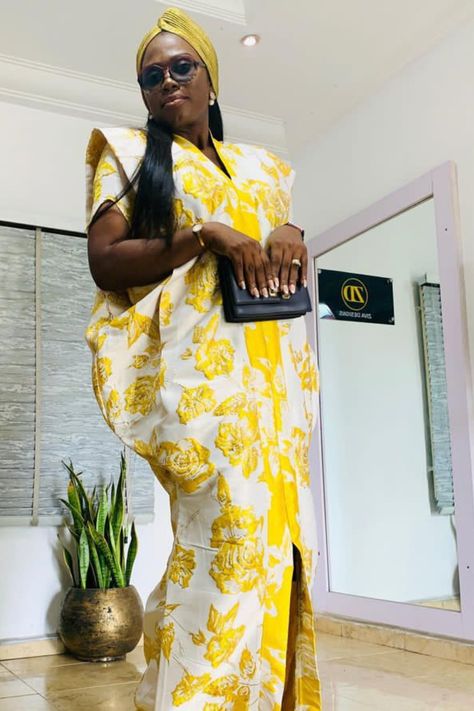 A lady wearing a brocade damask Kaftan Boubou Brocade Styles, Brocade Jacquard Dress Styles Nigeria, Brocade Damask Bubu Dress Styles Nigeria, Damask Bubu Styles Nigeria, Brocade Boubou Styles For Women, Nigerian Brocade Styles, Brocade Styles For Women 2024, Brocade Bubu Styles For Women, Brocade Gown Styles Nigeria