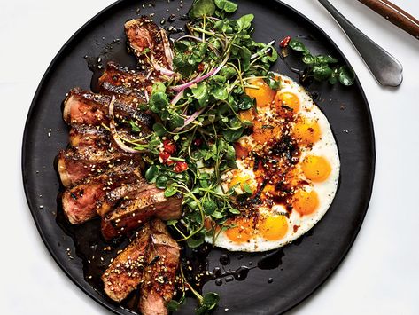 In this Steak and Eggs from Best New Chef Kevin Tien of Himitsu in Washington, D.C., a dozen fried quail eggs are a rich and playful pairing for Eggs Breakfast Ideas, Steak And Eggs Breakfast, Fried Quail, Best Egg Recipes, Miso Butter, Eggs Breakfast, Watercress Salad, Seared Steak, Eggs Recipe