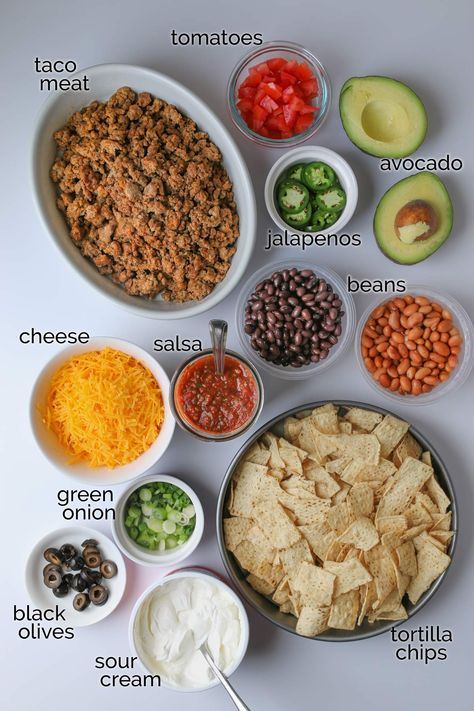 Nachos For A Party, Superbowl Nachos Bar, Nacho Recipe Easy, Build Your Own Nachos Bar, Mexican Nacho Bar, Football Nacho Bar, Make Your Own Nachos Bar, Nacho Platter Party, Build Your Own Nacho Bar