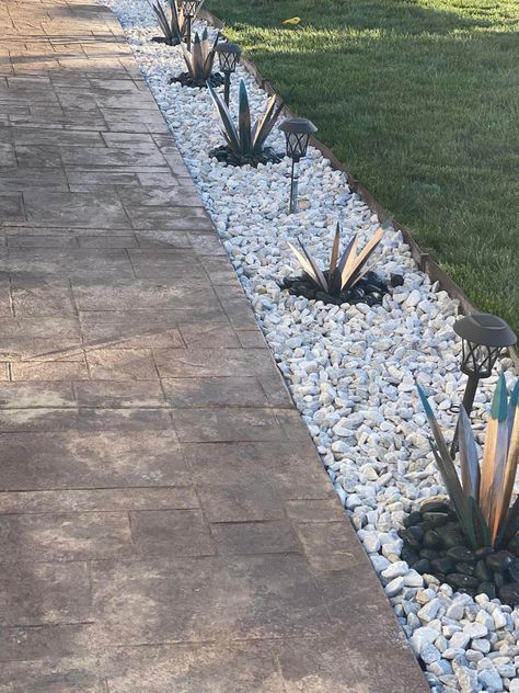 Grass Rock Border, Inground Pool Landscaping Ideas Rock Waterfall, River Rock Around Patio, Sidewalk With Rocks, Backyard With Rocks Ideas, White Rock Border Landscaping, Front Porch Rock Garden Ideas, Driveway Lined With Rocks, Gravel Flower Bed Ideas Front Yards