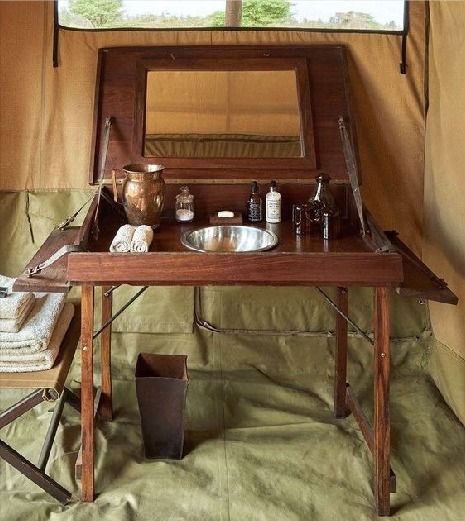 British Campaign Style, Wooden Camping Furniture, Campaign Furniture Bedroom, Vintage Explorer Aesthetic Room, Campaign Furniture Plans, Steampunk Safari, Camping Tent Decorations, Travel Furniture, Campaign Table