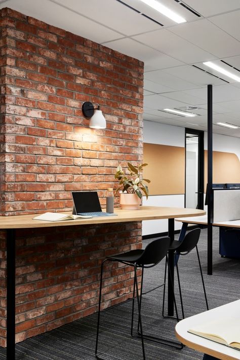 Office Brick Wall, Brick Wall Office, Ceiling Plants, Brick Wall Interior Design, High Tables, Office Space Decor, Brick Interior Wall, Office Design Inspiration, Wall Office