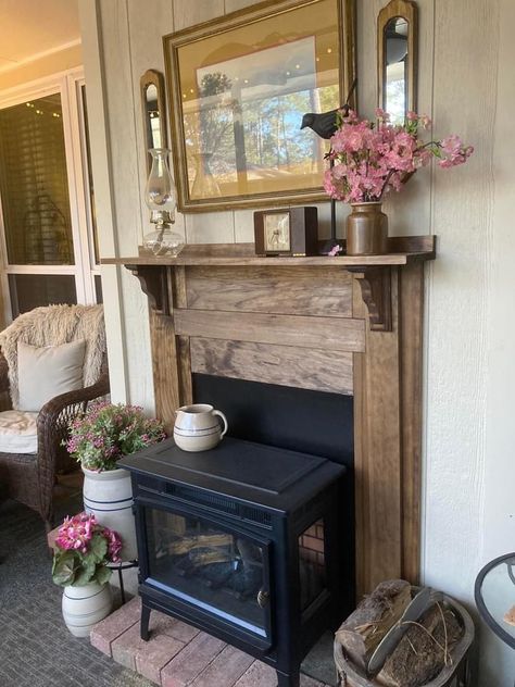 Free Standing Wood Stove Mantel, Small Fireplace Mantle, Rustic Faux Fireplace, Freestanding Electric Fireplace Ideas, Electric Wood Stove Ideas, Mantel Around Pellet Stove, Free Standing Electric Fireplace Ideas Living Rooms, Mantle Around Gas Wall Heater, Electric Stove Fireplace Ideas