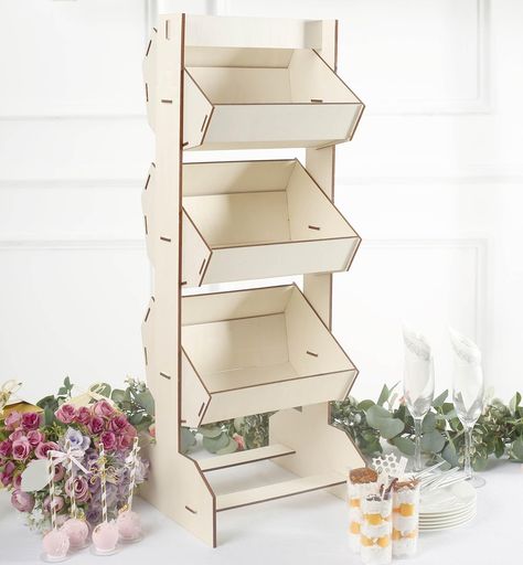 PRICES MAY VARY. Quantity: 1 Display Stand Material: Wood Color: Natural Style: Laser Cut 3-Tier Basket Display Stand Overall Size: 12"L x 12"W x 32.5"H Each Basket Size: 11.5"L x 8.75"W x 5.75"H Space between Baskets: 5" Wood Thickness: 4mm Assembly Required: Yes. Easy to Assemble. Instructions Included: Yes Accessories Included: Yes Perfect for displaying candy, fruits, bread, gifts, toys, retail products etc PREMIUM QUALITY: This cake stand is made from high-quality premium wood. This elegant Bake Sale Displays, Wooden Cupcake Stands, Basket Display, Table Top Display Stand, Dessert Holder, Cookie Display, Dessert Display Stand, Stand Feria, Standing Display