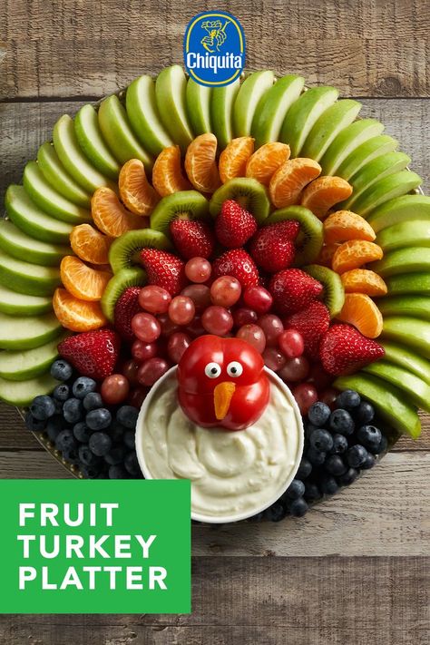 Looking for a fun and easy to make centrepiece for your Thanksgiving table? You’ll love our Fruit Turkey Platter. Made with Chiquita Bites® Sliced Juicy Green Apples and other fruit, this platter is really easy to assemble and particularly fun when you get your kids involved! Fruit Turkey Tray, Fun Thanksgiving Fruit Ideas, Creative Fruit Tray Ideas Thanksgiving Turkey, Thanksgiving Fruit And Veggie Platter, Turkey Fruit Charcuterie Board, Turkey Made Out Of Fruit, Turkey Vegi Tray, Turkey Fruit Platter Thanksgiving, Thanksgiving Fruit Platter Turkey