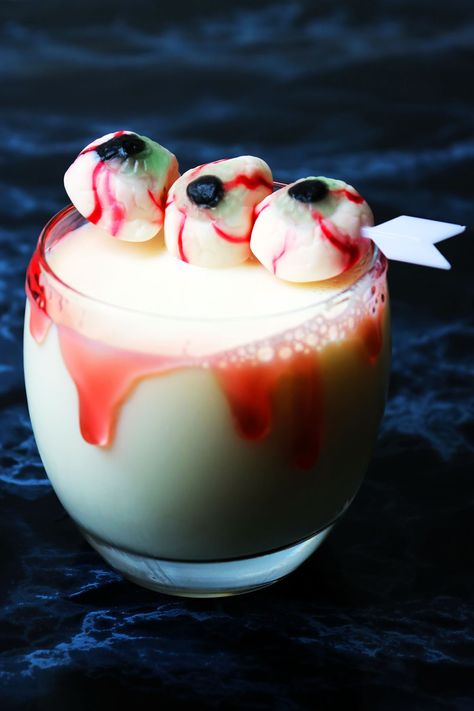 This White Zombie Halloween Cocktail is a twist on the classic White Russian Zombie Drink, Zombie Cocktail, Pumpkin Cake Pops, Halloween Pinata, White Russian Cocktail, Halloween Shots, Bloodshot Eyes, Halloween Cocktail, Halloween Themed Wedding