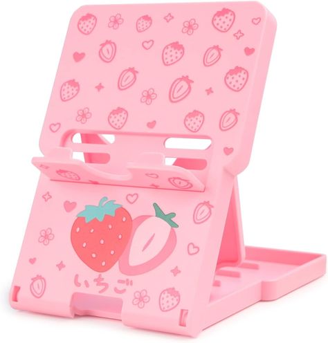 Upgrade your gaming setup with this adorable Cute Pink Strawberry Stand for Nintendo Switch! Keep your console stylishly propped up and ready for action. Perfect for gaming on the go or at home. 🍓🎮 Strawberry Stand, Switch Stand, Pink Video, Oled Switch, Hello Kitty Room Decor, Tech Inspiration, Hello Kitty Rooms, Steam Deck, Switch Lite