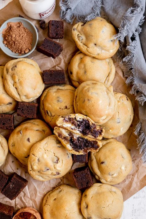 Thick, soft, brownie-filled centers, and lots of chocolatey goodness in every bite. These Brownie Stuffed Chocolate Chip Cookies are a combination of my classic Kroll's Kookies and an ooey-gooey homemade brownie tucked away in the middle. It's too good to be true! #browniecookies #brookies #browniestuffedcooked #brownies #chocolatechipcookies #giantcookies Brownie Filled Cookies, Brownies With Cookies On Top, Center Filled Cookies, Brownie Cookies Aesthetic, Brownie Stuffed Chocolate Chip Cookies, Large Stuffed Cookies Recipe, Chocolate Chip Cookies Brownies, Brownie Stuffed Cookies, Large Stuffed Cookies