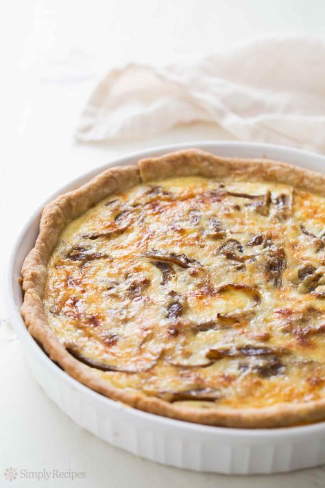 Caramelized Onion Quiche ~ Rich and creamy quiche with caramelized onions and Gruyere cheese. ~ SimplyRecipes.com #breakfastandbrunch #french #vegetarian #quiche Quiche, Caramelized Onion Quiche, Best Quiche Recipes, Baking Weights, Vegetarian Quiche, Onion Quiche, Cheese Quiche, Quiche Recipe, Caramelized Onion