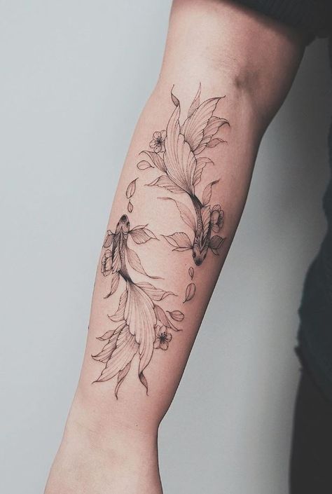 Floral Fish Tattoo - TattooLopediaTattooLopedia Blatt Tattoos, Pisces Tattoo Designs, Spinal Tattoo, Pisces Tattoos, Koi Tattoo, Forearm Tattoo Women, Fish Tattoo, Stylist Tattoos, Classy Tattoos