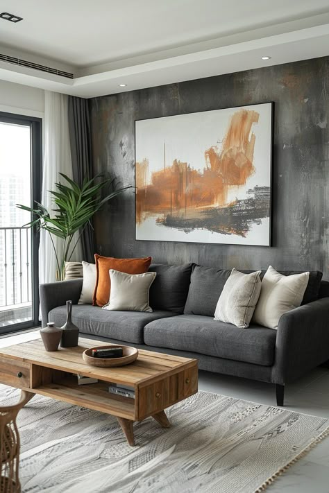 High Contrast Decor Living Rooms, Grey Theme Living Room Ideas, Dark Grey Sofa Living Room Modern, Living Room Contrast Wall, Living Room Couch Color Ideas, Minimalist Living Room Grey Couch, Black Sofa Interior, Dark Colour Sofa, Modern Living Room Decor Color Schemes