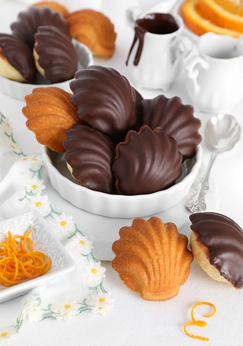 Chocolate Dipped Orange Madeleines Glazed Madeline Cookies, Chocolate Covered Madeline Cookies, Fall Madeleines, Madeline Cookies Decorated, Madeleine Flavors, Chocolate Dipped Madelines, Christmas Madeleines, Tea Time Cakes, Orange Madeleines