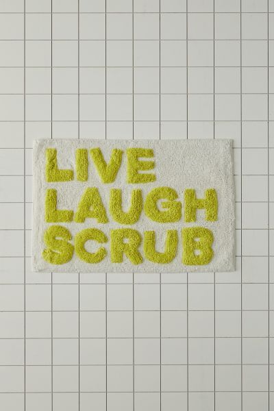 Live, Laugh and Scrub allover with this playful bath mat. Tufted from plush cotton that’s so soft underfoot, this bath mat features Live Laugh Scrub slogan text in statement block lettering. Available exclusively at Urban Outfitters. Cool Bath Mats, Fun Bath Mat, Miminalist Aesthetic, Urban Outfitters Bath Mat, Urban Outfitters Bathmat, Aesthetic Bath Mats & Rugs, College Apartment Bathroom Mats & Rugs, Fun Bath Mats, Bath Matts