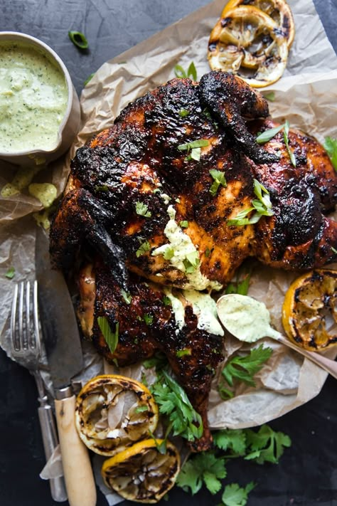 Rubbed with a smoky spice mix, our recipe for grilled spatchcocked chicken could not be easier. Let your grill do the heavy lifting while you whip up a garlicky herb sauce to serve on the side. Whole Grilled Chicken, Best Grill Recipes, Grilled Whole Chicken, Spatchcocked Chicken, Butterflied Chicken, Basil Herb, The Modern Proper, Modern Proper, Spatchcock Chicken