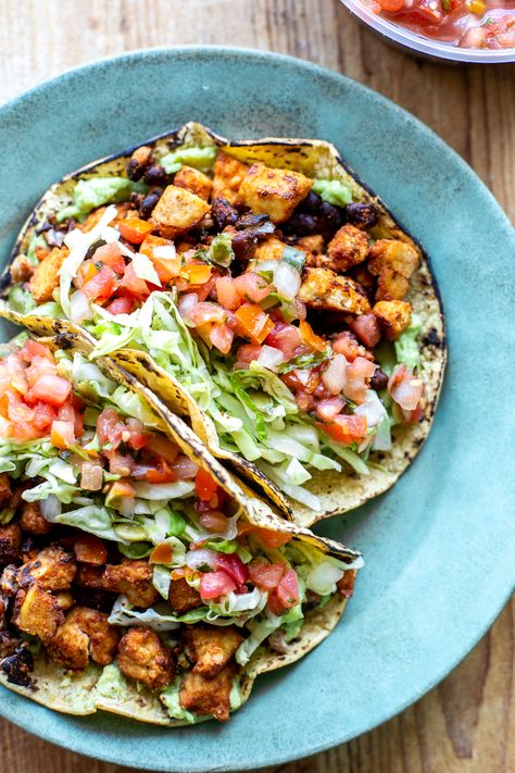 These Vegan Tofu Tacos feature a delectable tofu and black bean chorizo filling, bursting with spices and plant-based protein. Serve them on a corn tortilla with your favorite toppings for a mouthwatering vegan dinner that can be ready in just 30 minutes! Tofu Breakfast Tacos, Vegan Corn Tortilla Recipes, Healthy Vegetarian Tacos, Taco Recipe Vegetarian, Vegetarian Breakfast Tacos, Tofu Tacos Recipes, Plant Based Lunch Ideas, Mexican Vegan Recipes, Black Bean Tofu