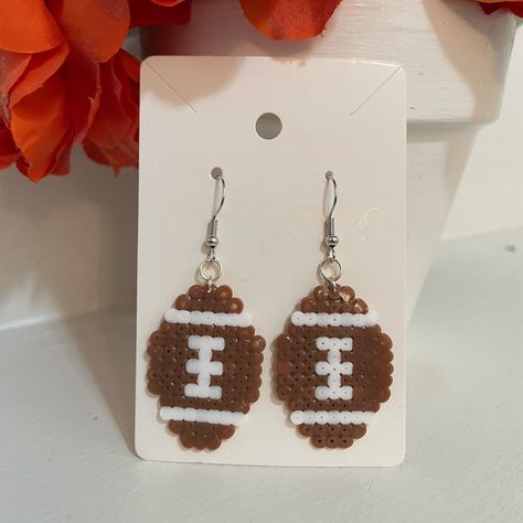 Perler Bead Football Earrings Brown And White New Handmade 1.5” Inches Perler Beads Bundle To Save Don’t Be Afraid To Send Offers :) Diet Coke Perler Beads, Kansas City Chiefs Perler Beads, Small Perler Bead Design, Peler Bead Christmas, Mini Perler Bead Earrings, Simple Perler Beads, Perler Bead Earrings Patterns, Perler Beads Keychain, Perler Bead Coasters