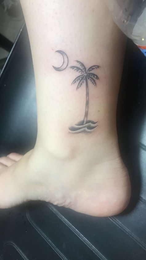 South Carolina palmetto moon and tree with waves tattoo South Carolina Palm Tree Tattoo, South Carolina Tattoo Men, Palmetto Tree Tattoo South Carolina, Myrtle Beach Tattoo Ideas, Palm Tree Moon Tattoo, Palmetto Tattoo, South Carolina Tattoo Ideas, Palmetto Tree Tattoo, South Carolina Tattoo