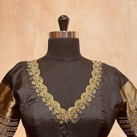 BlouseHousebyMahithaPrasad on Instagram: "Giving off empress-like vibes with its sleek and shadowy elegance, this Black Silk and Zari Blouse is from our Dollops of Handcraft collection. This mystique black piece has Scallop Cutedge Embroidery on the neckline as well as on the shape given in the center of the back. The shape on the back is studded with dainty Threads and Beads. The signature embroidery graces the Zari Sleeves and Back Waist. Starting at INR 4,000 only, these luxurious creatio Scallop Blouse Designs, Handwork Designs, Blouse Handwork, Maggam Blouses, Maggam Blouse, Boutique Blouse, Blouse Works, Scalloped Blouse, New Saree Blouse Designs