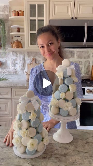 Lindsay Ara on Instagram: "✨TIPS FOR MAKING MACARON TOWERS✨ • Macaron towers take the macarons to the next level when it comes to the display! I find it displays the macarons very beautifully compared to a platter of them. Here are some tips when it comes to making one 👇🏼 • 🤍 MACARON SIZE: you can choose to have all macaron shells of the same size, or a combination of smaller and larger macarons, depending on the look you are going for. I created all of mine in equal size using my @shoptheflourgirl template mat • 🤍CAKE BOARD: use a cake board to secure the cone to, to provide a base for the tower, and to support the bottom layer of macarons. The board also makes transfer to/from the fridge/table top/boxes easier! • 🤍 CONE SIZE: make sure to select a cone that fits the number of macaro Macaroon Display Ideas, Macarons Tower, Macaron Template, Macaron Tower, Tall Cakes, Icing Tips, Bridal Shower Cake, Edible Glitter, Cake Board