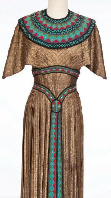 Gold lamé Egyptian gown worn by mezzo-soprano Blanche Thebom in The Great Caruso (c. 1951) designed by Helen Rose and Gile Steele. Egyptian Gown, Ancient Egypt Dress, Ancient Egypt Clothing, Egypt Clothes, Egyptian Inspired Fashion, Egypt Clothing, Ancient Egyptian Fashion, Egypt Dress, Ancient Egyptian Clothing