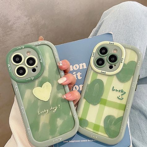 Protect your phone in style with the Cute Green Heart Love Lucky Letters Shockproof Bumper Phone Case. This case features a fun design with a shock-absorbing bumper for added protection. It's made from high-quality materials and has precise cutouts for easy access to all your phone's features. Express your personality while keeping your phone safe with this unique and playful case. Iphone Cases Green, Case Hp Design, Sparkly Phone Cases, Diy Phone Case Design, Green Phone Case, Retro Phone Case, Stylish Iphone Cases, Girly Phone Cases, Kawaii Phone Case