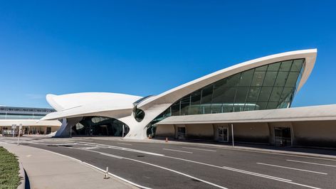 TWA Hotel inside Eero Saarinen's JFK Airport terminal opens reservations Twa Flight Center, Twa Terminal, Twa Hotel, Flight Centre, Jfk Airport, Airport Terminal, Airports Terminal, Landmark Buildings, Santiago Calatrava