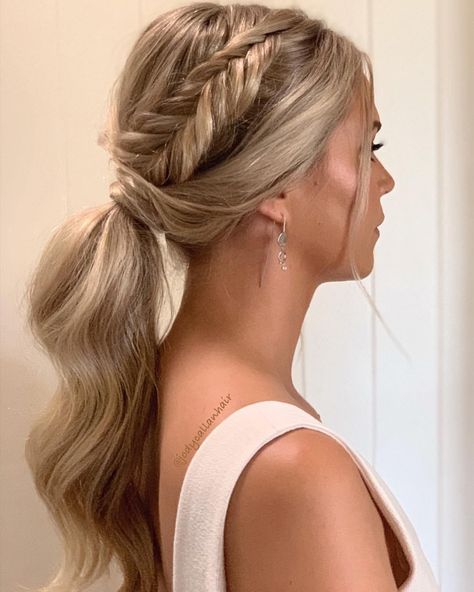 Beautiful fishtail braided ponytail on long blonde hair. Looking for some hair inspo? Get ready to turn heads this Valentine's Day with these stunning hairstyles! From romantic updos to flirty curls, we've got you covered. Whether you're celebrating with your special someone or hitting the town with your friends, these hairstyles will make you feel extra beautiful. Fishtail Braid Bridesmaid, Ponytail Fishtail Braid, Bridesmaid Ponytail, Bridesmaid Hair Ponytail, Bridesmaid Hair Inspo, Bridesmaid Hair Braid, Bridemaids Hairstyles, Cute Prom Hairstyles, Updo Bridesmaid