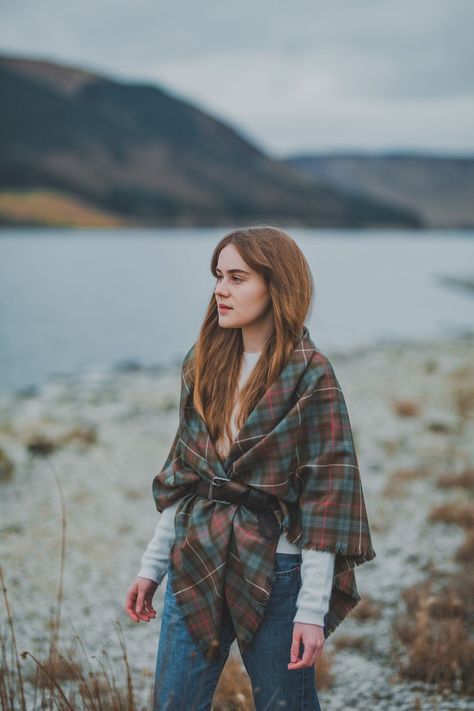 "FREE SHIPPING Beautifully versatile self-fringed Scottish 100% wool tartan Shawl, carefully handmade in Weathered Hunting Fraser tartan, a subtle traditional Clan tartan woven in muted tones of grey and brown featuring fine white and pale red highlights. Inspired by the costumes and styling of Outlanders Claire Fraser, this generously large shawl measures approx 145cm square and can be worn so many ways ,offering inherent insulating warmth without bulkiness.   This traditional 10 oz soft wool t Scottish Fashion Woman, Scotland Outfit, Fraser Tartan, Tartan Shawl, Scottish Women, Je Suis Prest, Scottish Fashion, Claire Fraser, Red Highlights