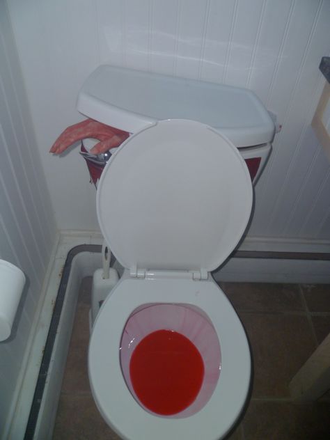 Halloween Bathroom Idea!  Wick a bottle of red pool dye, tip to the side...blood red flush everytime!  Put a red glow stick inside toilet tank, severed hand in tank sticking out!  Awesome! Halloween Ideas, Läskig Halloween, Scene Del Crimine, Halloween Decorating Ideas, Cheap Diy Halloween Decorations, Halloween Bathroom, Casa Halloween, Halloween Fest, Halloween House Party