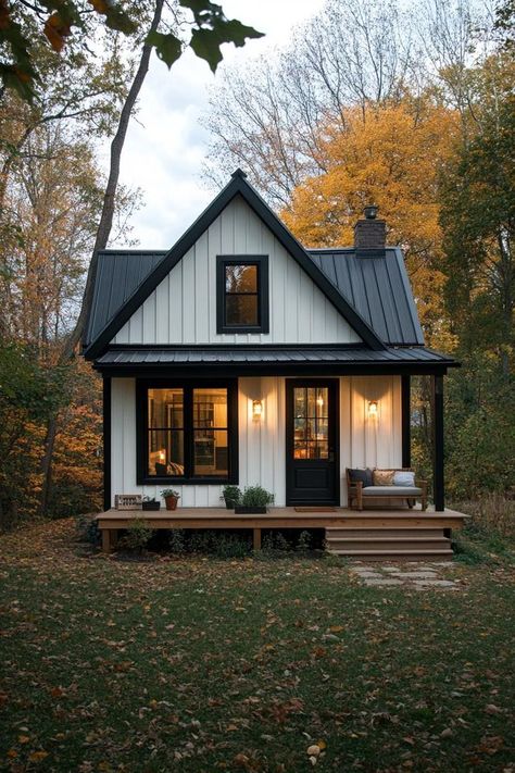 Check out more and fall in love with these small but charming and cozy small houses, from cottages to modern cabins. Live tiny at large! 😍 42 Cozy Small Houses Proving Little Is More White Black And Wood House Exterior, Mini Cottage Small Houses, Small Addition To Back Of House, Tiny Home Outside, Tin Siding House, Tiny House Cottage Style, Small House Siding Ideas Exterior, Small House Design Exterior Simple, Small House With Porch